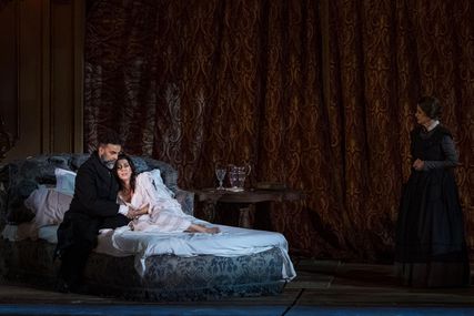 Lisette Oropesa as Violetta Valery and Alessandro Spina as Doctor Grenvil in La traviata at Arena di Verona