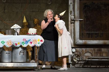 Lisette Oropesa as Gretel and Gerhard Siegel as The Witch in Hansel and Gretel at Metropolitan Opera