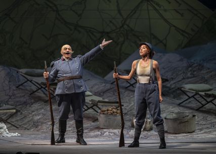 Lisette Oropesa as Marie and Alessandro Corbelli as Sulpice in La fille du régiment at Lyric Opera of Chicago